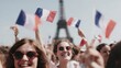 © Viktoriia - Cheering crowd with French flags celebrating in Paris