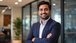 © Pro Clipart - High resolution corporate portrait of a smiling Indian businessman in a smart blue suit. This high quality photo is perfect for career consulting, corporate media, and professional ads.