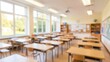 © rahwik - Beautiful blurred background of bright classroom and study room with panoramic windows and beautiful lighting. Blurred school classroom without students with empty chairs and tables.