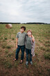 © Irina Polonina/Stocksy - Two Young Boys Enjoying a Day in the Grassy Field