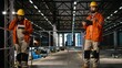 © DC Studio - Portrait engineer, hard hat, large-scale facility, steel work machinery, welding activity and large-scale production line demonstrate the power of heavy industry infrastructure.