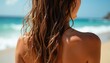 © Vadym - Woman with wet brown hair at beach ocean backdrop. Sunlit tanned skin, salty water, summer vibe, vacation mood, natural beauty. Healthy lifestyle, self care.