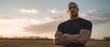 © Dream - Professional athlete standing proudly confident yet introspective posture midst of open field dawn illuminated soft natural morning light shot medium length shot point of view capture subtle