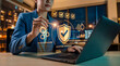 © Mk Design store - Cybersecurity and system verification concept with businesswoman using laptop and futuristic glowing digital interface for data protection, Digital signature, e-signing.