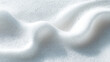 © Viktoriia - Smooth cosmetic mousse foam smear, airy and fluffy white texture with glossy highlights, soft and light appearance, isolated on clean white background, minimal skincare aesthetic