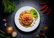 © Iksan Picture - A visually appealing and appetizing plate of savory fried rice adorned with decorative sausage slices arranged in a floral pattern, complemented by fresh lettuce and exotic culinary elements