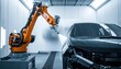 © Limalas - Orange Robotic Arm Spraying Dark Car Body in Modern Automotive Paint Booth