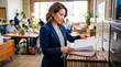© detry26 - Woman hr manager searching for employee document in filing cabinet. Corporate administration professional working in office. Human resource development, business recruitment, staff record