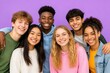 © Babb - Diverse group of smiling teenagers posing together in studio