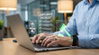 © HADI INCREDIBLE - Professional using laptop with digital compliance checklist and legal icons for corporate governance and risk management