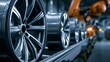 © Oleh - Alloy wheels manufacturing in an automated factory, robots working on the production line, representing modern automotive industry and advanced technology
