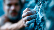 © Aliaksandra - Close-up of chalked climber hand gripping rough rock wall, ideal for climbing, fitness, adventure sports, strength, and determination concepts
