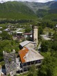 © Frauke Scholz/imageBROKER - Historic building in a mountainous landscape with defence tower house and green surroundings, aerial view, defence tower, Majvdieri, Mestia municipality, Svaneti, Caucasus, Georgia