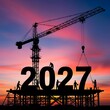 © saba - Construction workers building large numbers for the year 2027 against a vibrant sunset sky.