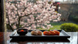 © Lumière Atelier - Delicious Sushi Platter with Cherry Blossoms and a Hint of Spring in the Background