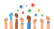 © DHS - People raising fists in solidarity during a virus outbreak, representing unity, strength, and collective action against the pandemic threat.