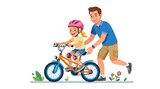 Man helping a little girl riding a bike with training wheels outdoors