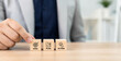 © Omid studio - Goal, plan, action, business strategic planning concept. Wooden blocks labeled 'Goal' 'Plan' and 'Action' representing strategic progression toward success. Business motivation and inspiration concept