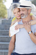 © auremar - happy elderly couple hugging outdoors