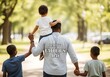 © Md Yeasin - Happy fathers day celebration with african american family walking outdoors