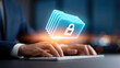 © Tiravad - Secure file folder icon glowing above hands typing keyboard, conveying data protection and encrypted document management with focused professional
