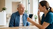 © Iuliia - Female speech therapist helping senior man with articulation exercises using mirror and cards. Professional speech pathology session for elderly patient rehabilitation and recovery.