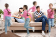 © New Africa - Family with hyperactive child. Daughter running around tired parents at home