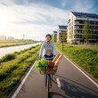 © Sorf - Woman cycling on urban riverside path with groceries in bike basket during sunny day