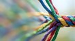© Isabellafaith - Colorful Ropes Twisted Together Representing Connection and Partnership