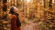 © Jamesoliver - Woman Breathing Fresh Air in a Golden Autumn Forest During October