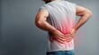 © MoodFrame - Man experiencing lower back pain, highlighting health and discomfort.