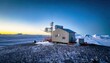 © galih - Remote Antarctic Research Station at Dawn - A Beacon of Science.