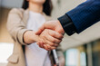 © BusinessClass by W61 - Close up of business handshake for new job hiring at the office