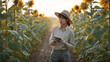 © bephoto - 夕方のひまわり畑で日本人女性農家が作物を確認している