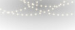 © dedstock - PNG. Christmas glowing LED string garland on transparent background. Bright festive bulbs for holiday decoration. Vector isolated element for design work.