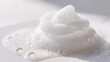 © Lumi Stock Studio - Premium white cleansing foam dollop texture closeup with delicate bubbles, gentle skincare cleanser swatch concept, editorial beauty photography with copy space