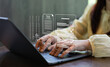 © Father_Studio - Businesswoman filing taxes online using a laptop with digital tax form interface. E-filing, tax compliance, financial documentation, online accounting, fintech services and paperless workflow.