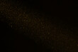 © Maxim Chuev - Stardust. falling shower rain corpuscular particle snow flying fallen Freeze shot on black background isolated overlay Spray water yellow golden gold dust explosion abstract powder splattered