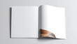 © suu - Open blank magazine or book with textured page corner, clean design for mockup or editorial use, neutral grey background