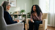 © Asad - Mental health therapy session with black woman patient, professional counseling with female psychologist, diverse women in clinical consultation