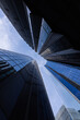© SellStock - Low angle view of modern glass skyscrapers in business district