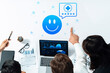 © InfiniteFlow - A business team collaborates on analyzing customer feedback and satisfaction metrics displayed on a laptop, aiming for strategic improvements and insights for future success. Cyphers