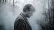 © Patcharin - Inside the mind of a person facing depression concept. A contemplative figure shrouded in mist, evoking deep emotions.