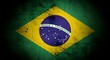 © Ram Dutta - Brazil flag on cracked concrete background with motto ordem e progresso