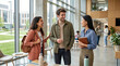 © Vera D - Group of happy university students talking in modern campus corridor, cheerful young friends with backpacks and notebooks standing inside bright college hall, high education concept