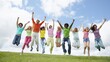 © The Little Hut - Diverse group of joyful young adults jumping for success and happiness in a sunny outdoor field