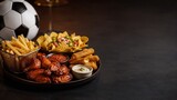 Dark soccer food platter with copy space