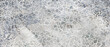 © UmmeFarhatunnesa - Terrazzo backdrop shows a weathered grey cement block stamped with a beautiful mosaic pattern of dense stone fragments