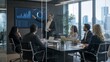 © Kevin - Speaker points to a large screen displaying financial charts and graphs in a modern glass-walled boardroom.