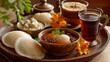 © Anzel Art - Traditional South Indian Breakfast Platter with Idli, Chutney, Sambar and Herbal Tea
